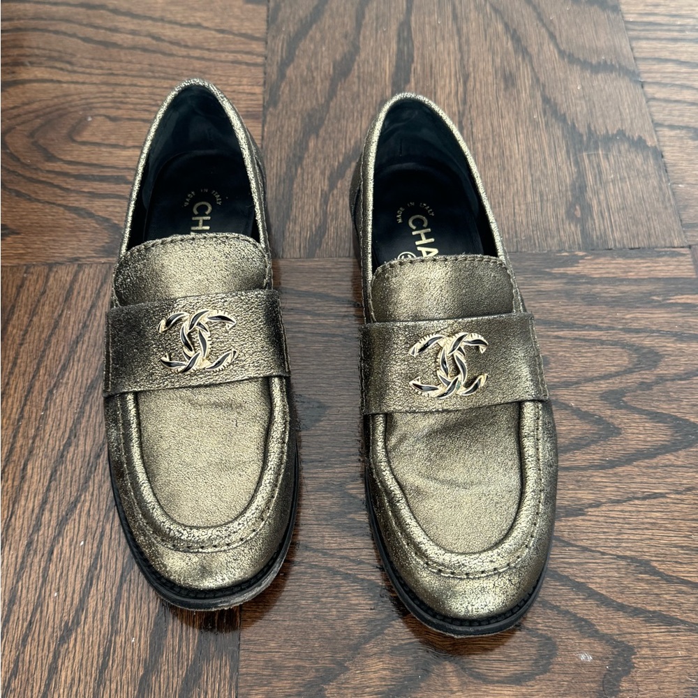 CHANEL Gold Loafers with Logo Accent